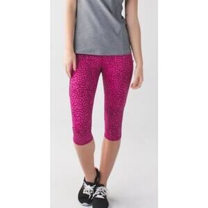 Lululemon sz 2 pink  like new line leapord pink cropped zipper pocket EUC girly